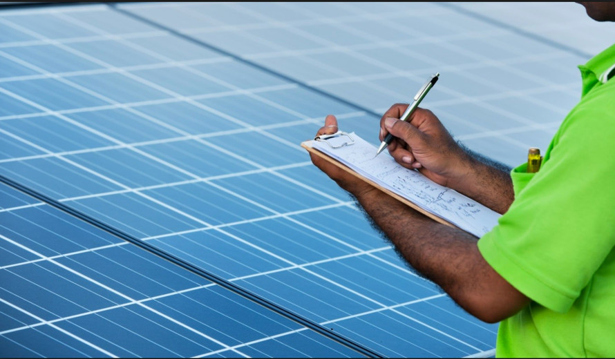 A technician manually records problem areas for further investigation.